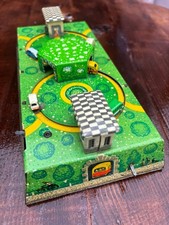 Vintage tin wind up/mechanical toy busses stations