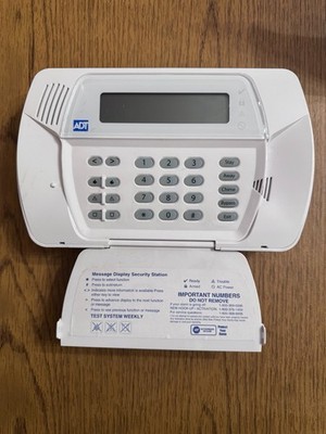 ADT WIRELESS ALARM COMMUNICATOR KEYPAD LE2077-NA UA735 KEY PAD