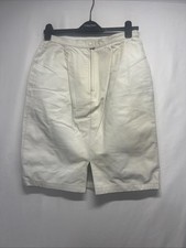 cream vintage leather midi skirt featuring a structured front-zip closure Size12