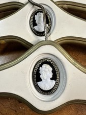 set of 7 vintage 1940s Hollywood Regency Cameo Wood Hangers.
