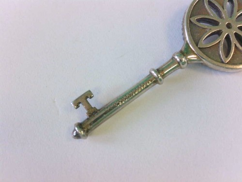 Tiffany & Co. Sterling Silver 925 Daisy Wheel Diamond Key Pendant/18" Necklace. - Picture 5 of 13