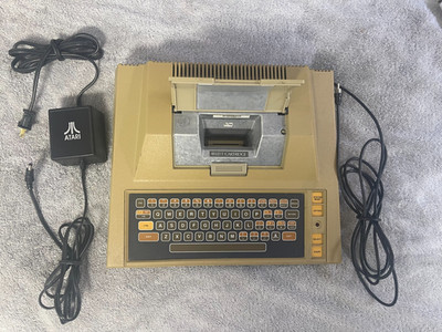 Atari 400 Computer System Console 4 original controllers 10 games powers on