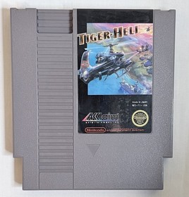 Cartucho Tiger-Heli (NES) y manual solo con funda antipolvo probado y funcionando