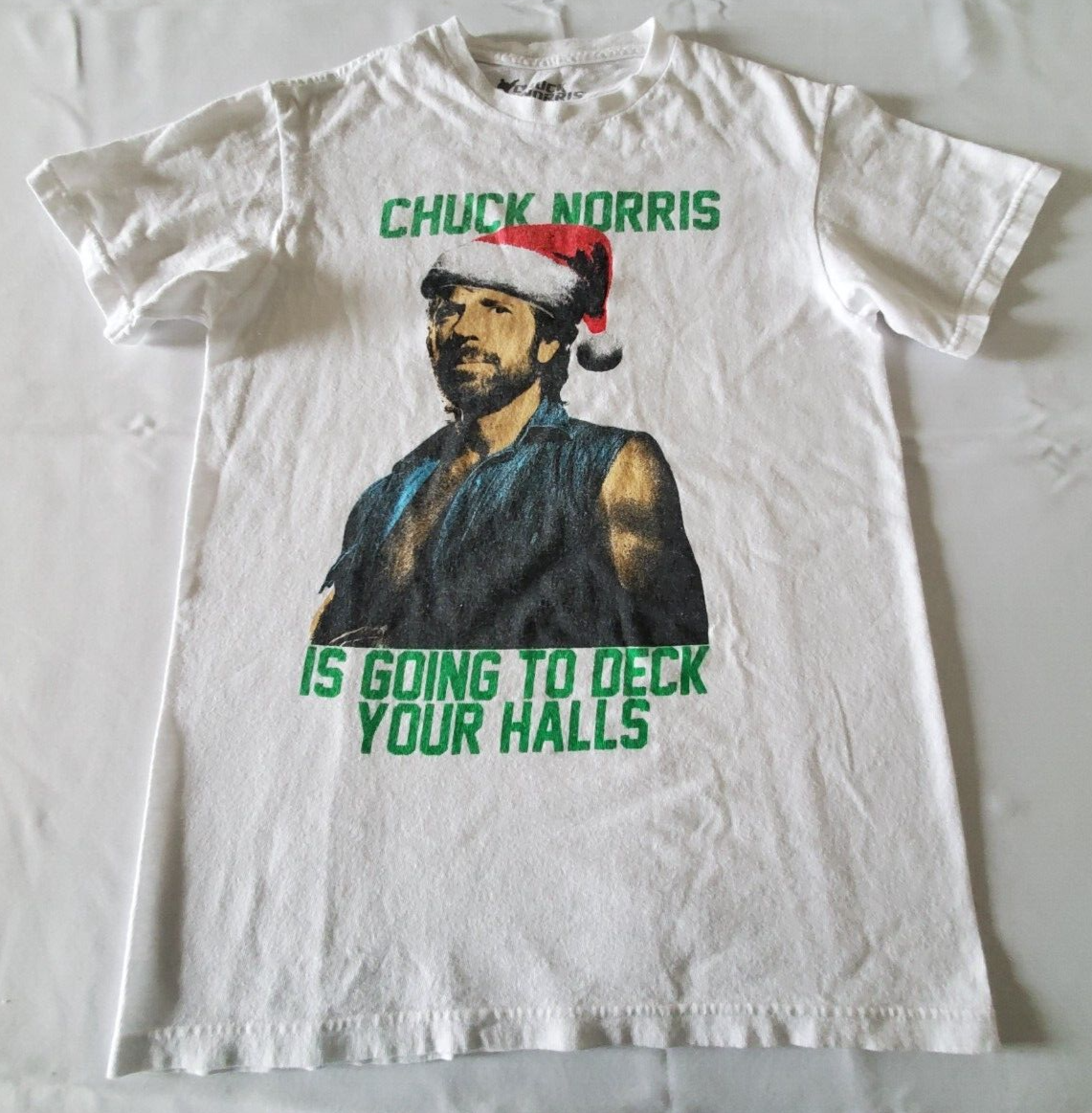 Chuck Norris Is Going To Deck Your Halls Christmas Graphic T-Shirt