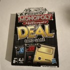 Hasbro Monopoly Millionaire Deal Card Game Sealed 2011 New Damaged Black Box
