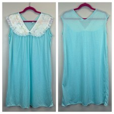 Vintage sleeveless nightgown in a turquoise aqua, featuring a floral lace design