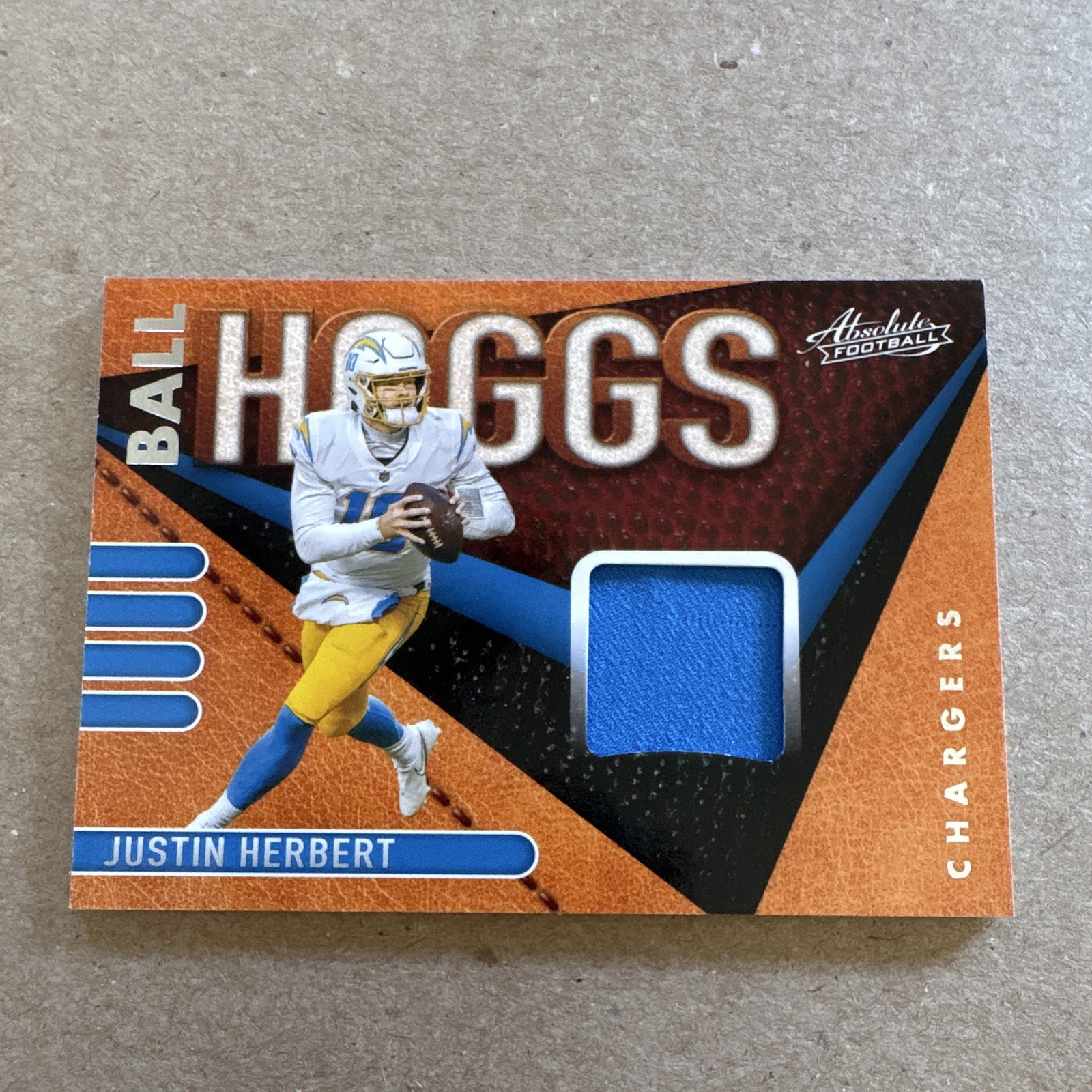 Panini 2021 Absolute Ball Hoggs Relics Justin Herbert Chargers #BH1 MEM