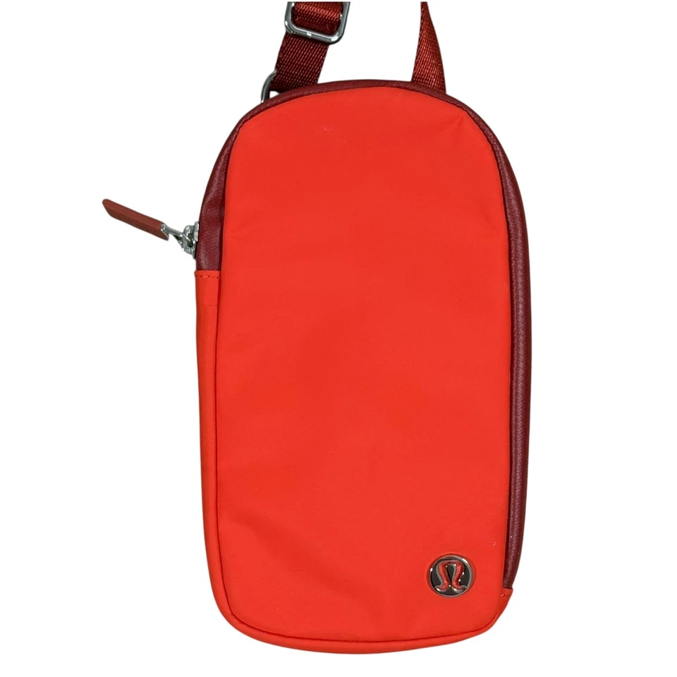Lululemon Doble Bolsa Bandolera Conjunto Naranja OS Muñequera Atletismo Ranuras para Tarjetas Foto 2 de 4