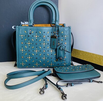 coach rogue with rivets