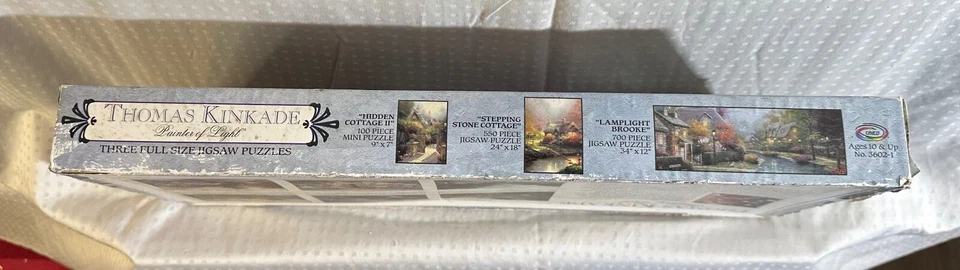 10 PUZZLES DIFERENTES - ROMPECABEZAS THOMAS KINKADE a través de 3 DIFERENTES 3 PAQUETES Y 1 SOLO Foto 4 de 4