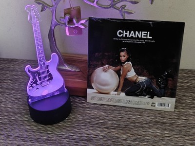 Tyla CHANEL Signed 7