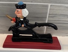 Vintage Cast Iron Soldier Nutcracker on Wood Base Painted Figural Colonial Style
