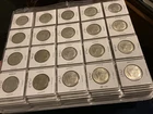 Book packed with 161 Kennedy 40% silver half dollars - great condition