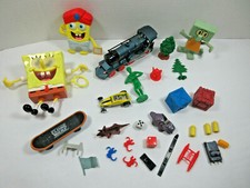 mixed lot toy figures parts train spongebob squidworth trees car skateboard