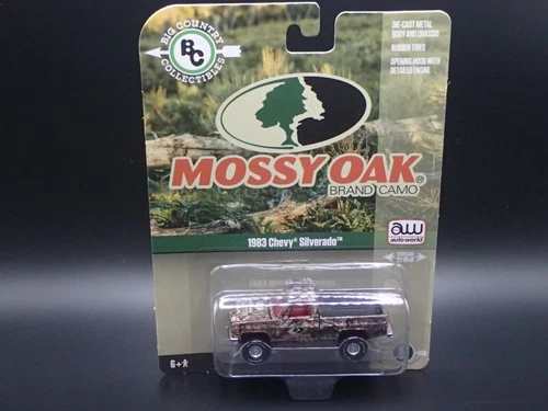2026 AUTO WORLD 1983 CHEVY SILVERADO MOSSY OAK ULTRA RED CHASE BIG COUNTRY