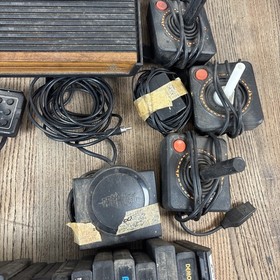 Atari 2600 Game Console W/ Controls & 20 Games w/ paddles & joysticks Untested