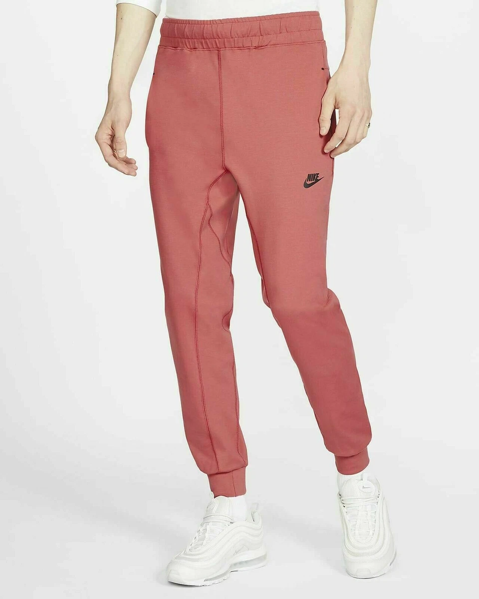 Pink nike pants best sale mens
