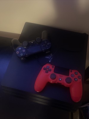 Sony PlayStation 4 Pro 1TB Console - Black With Two Controllers Red And Black