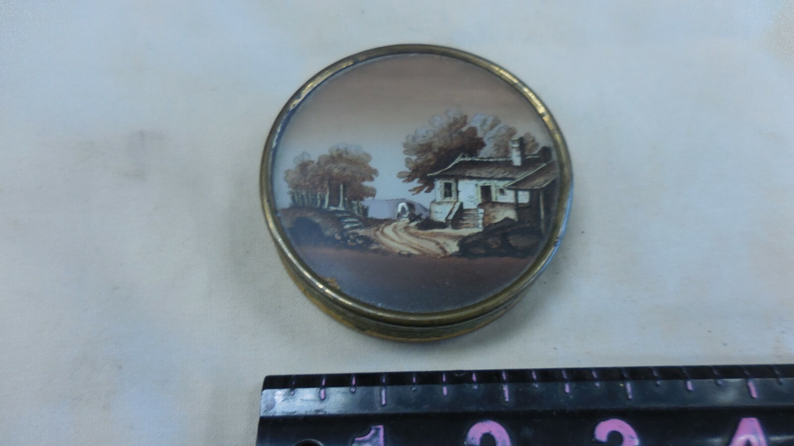 VINTAGE ROUND  METAL TRINKET BOX WITH HAND PAINTED SCENE 2.5 INCHES--GLASS BEADS