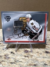2003-04 Pacific Luxury Suite - Tuomo Ruutu PUCK & AUTO /299 Chicago Blackhawks