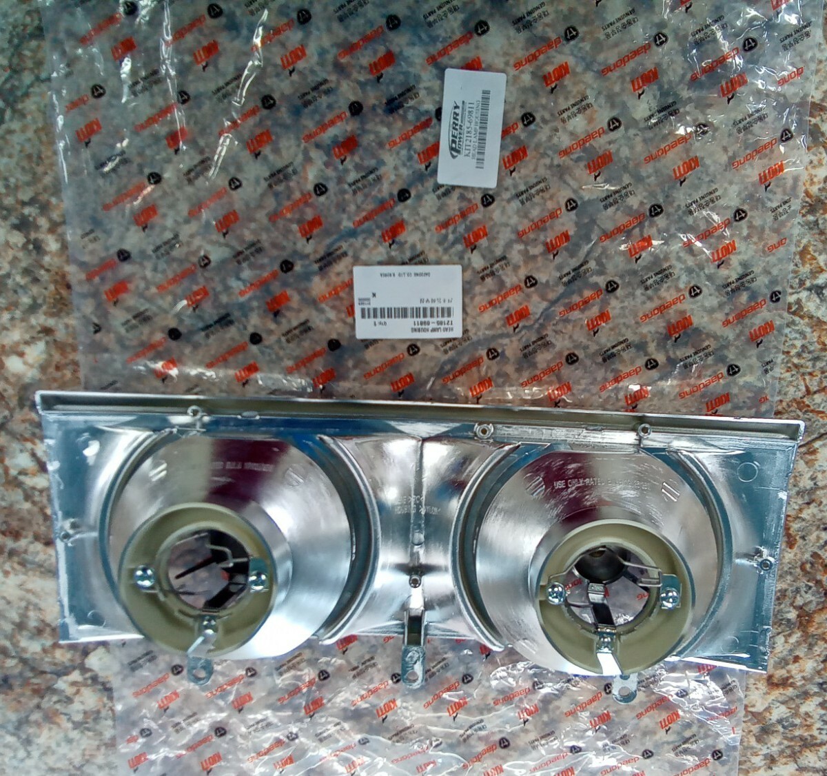 Nuovo Originale OEM KIOTI T2185-69811 Testa Lampada Alloggio, per ...
