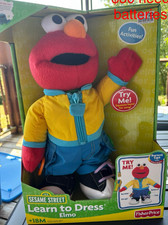 Fisher-Price Sesame Street Learn to Dress Elmo Plush Toy 18 Months MPN B9076