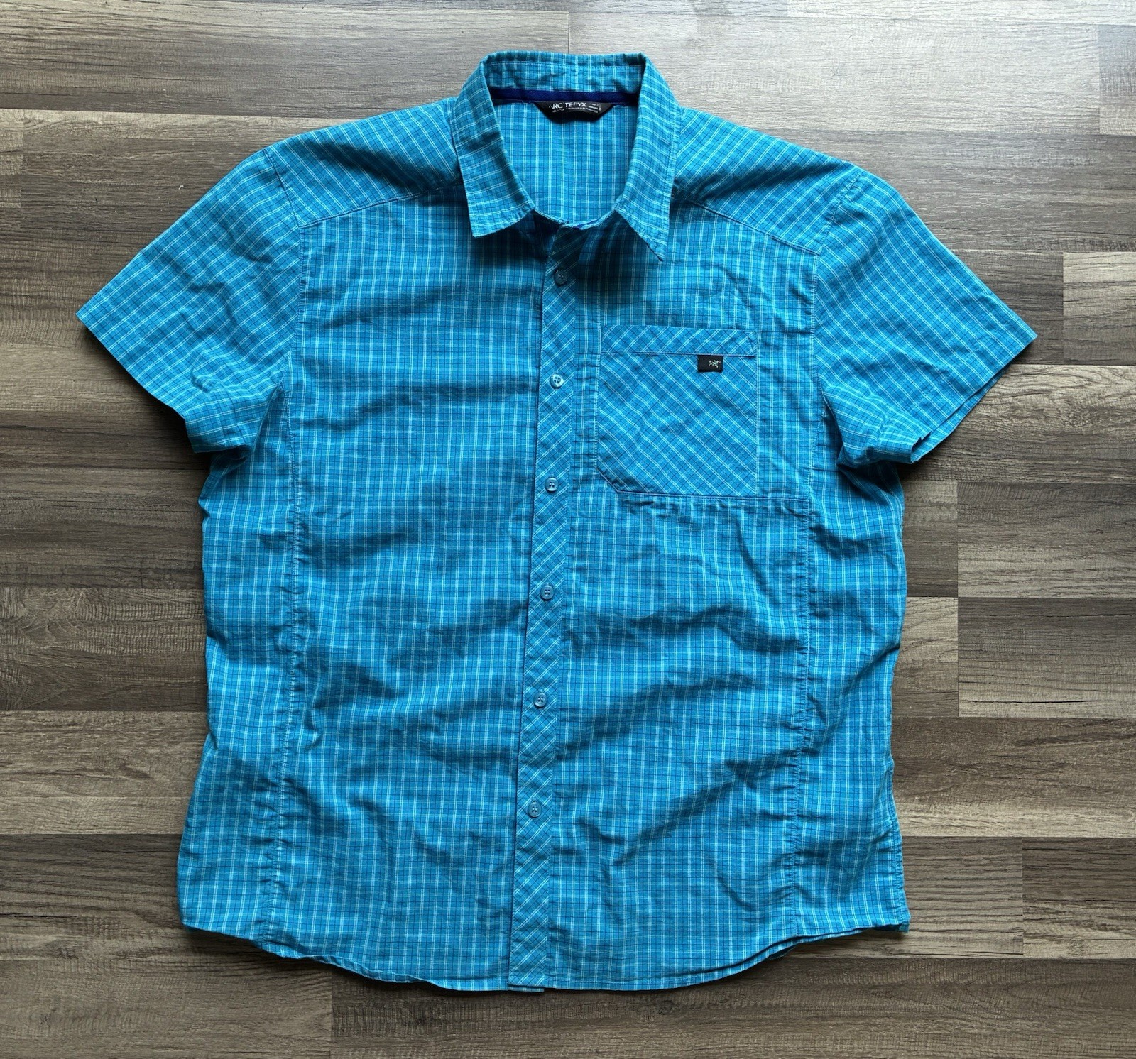 Camicia Arc'teryx grande blu con bottoni manica corta outdoor escursionismo lavoro colletto