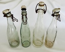 Lot of 4 Antique Estonian Pärnu Glass Bottles Swing Top Porcelain Pre-WWII