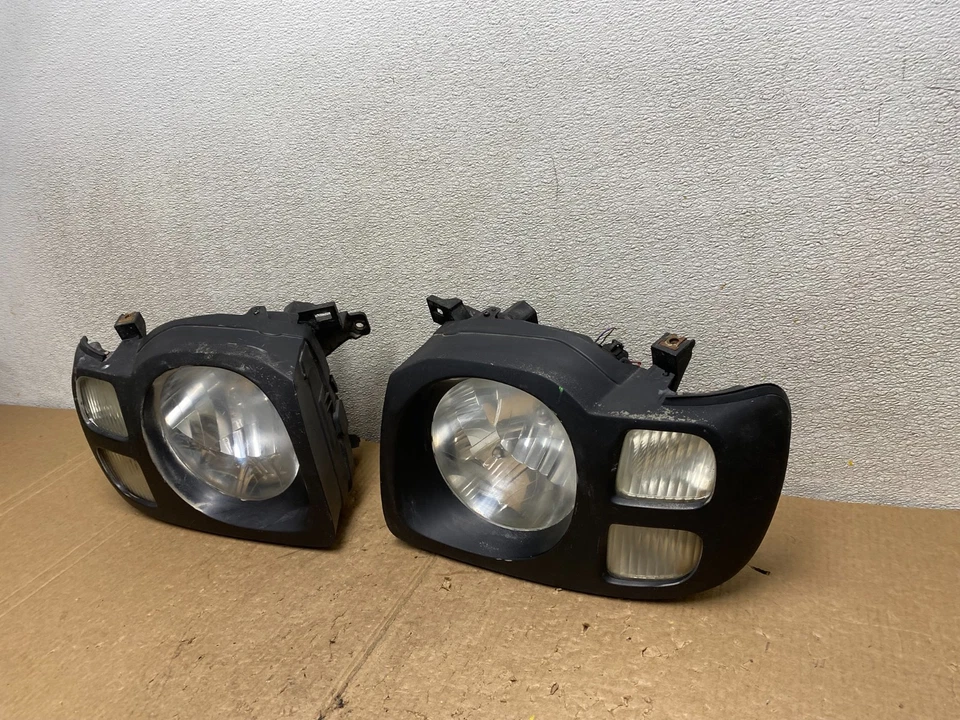 Faros laterales izquierdo+derecho Nissan Xterra 2002 2003 2004 V3215 DW Foto 2 de 4
