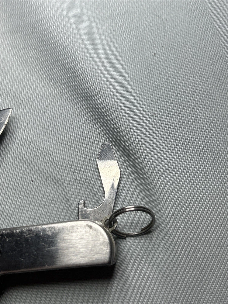 Multi Tool Swiss Army knife With Screw Driver Cork Open And More! ELEVEN Tools!
