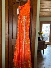 PromGirl One-Shoulder Neon Sequin Long Prom Dress. It has never been used!!