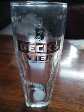 Beck's Vier half pint glass. Embossed with Beck's Vier and with head saver.