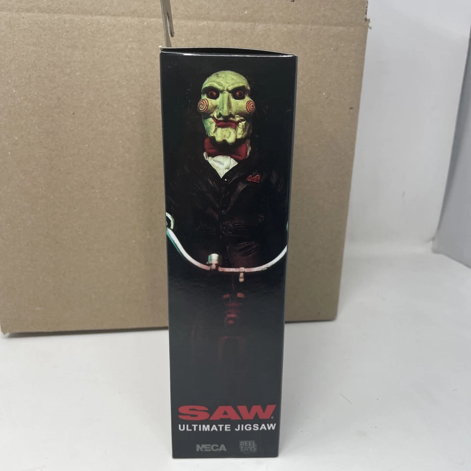 Figura de acción NECA SAW Ultimate Jigsaw 7” lanzamiento 2024 nueva en caja horror coleccionable Foto 4 de 4