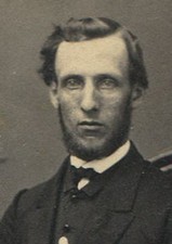 MAN SEATED, CHECKED FLOOR. STRONG CONTRAST. CDV BY GANO, ALLEGHENY, PA.