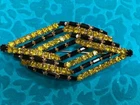 GORGEOUS VTG BLACK AND YELLOW PRONG SET RHINESTONE PIN/BROOCH- COSTUME JEWELRY