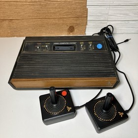 Atari 2600 Console in Box with Game Lot And Collector OEM Case Untested