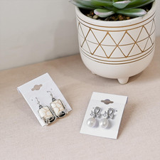 100 pieces of 1.5 x 2-inch plain white velvet hanging earring cards serve as ...