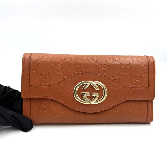 11.05 009  Gucci GG Logo Embossed Leather Long Wallet