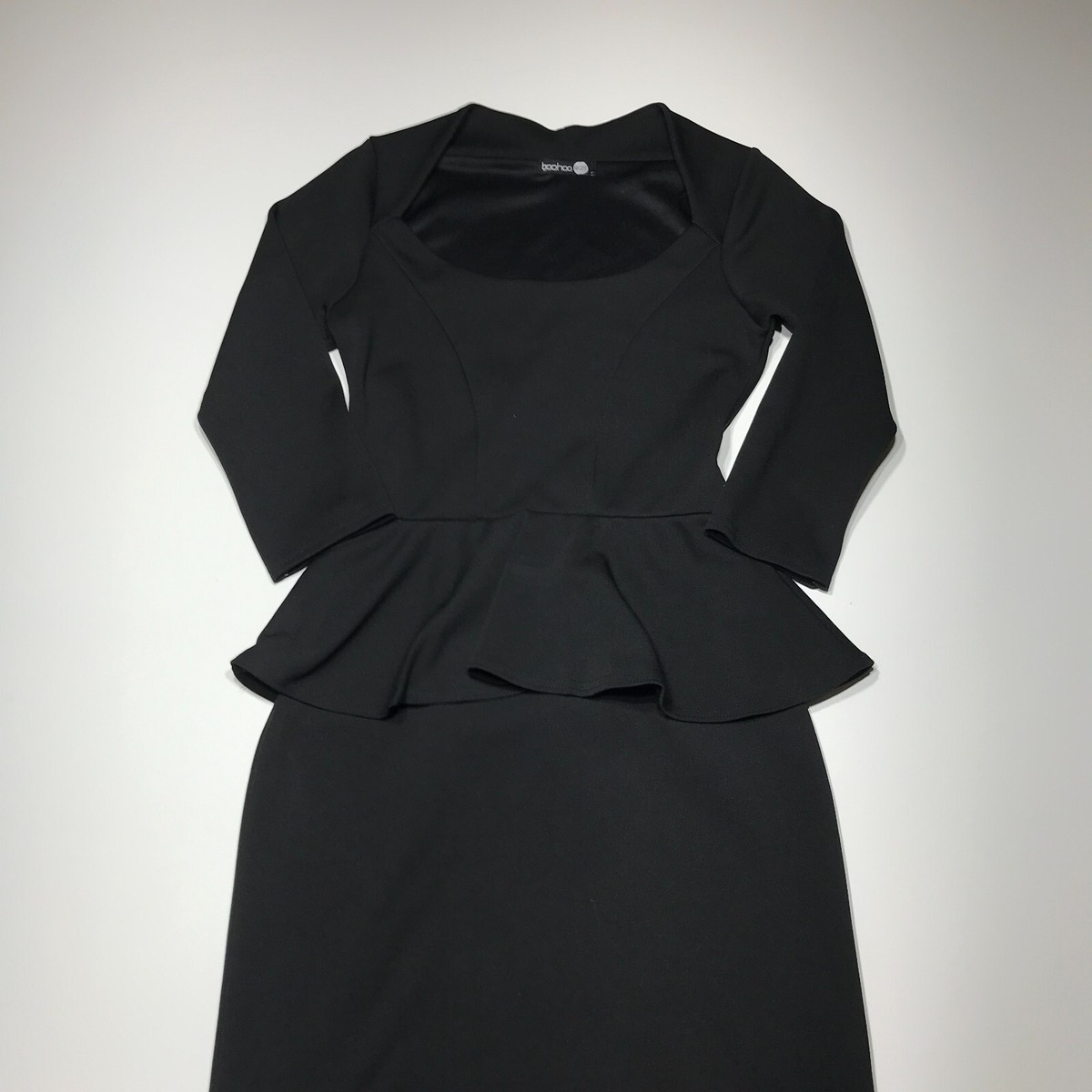 evaluate the fashion and e-commerce company boohoo on mini dresses boohoo Women's Plus Contrast Drape Detail Mini Skater Dress in Black | Size: 12