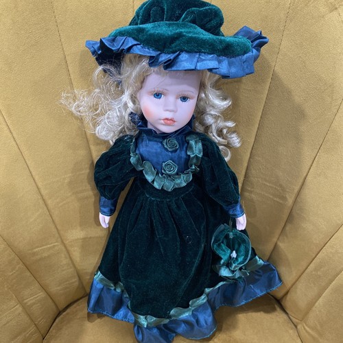 Porcelain Doll Dressed In Green Velvet Dress With Hat & Bag Blonde Blue