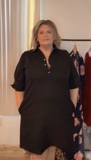 Gorgeous Black Shift Dress With Ruffled Three-Quarter Sleeves Henley Neck Line.