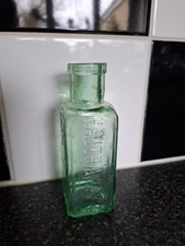 Hauthaways Peerless Gloss Aquamarine Glass Bottle c1900s Victorian