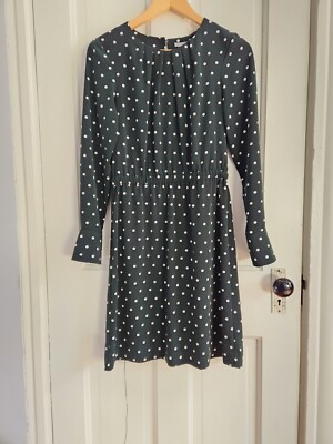 green emerald velvet dress Smocked Shamrock Dress in Emerald Green with White Polka Dots – Pleats and  Stitches main image 0