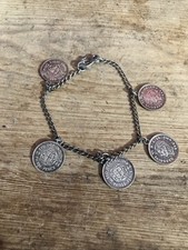 Sterling Silver Charm Bracelet With Coin Charms