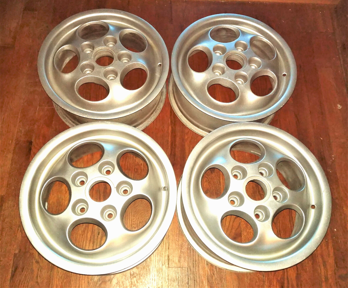 4) PORSCHE PHONE DIAL WHEELS. (2) 15x6 & (2) 15x7. VERY NICE ITEM