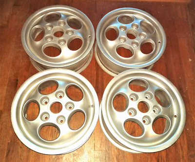 4) PORSCHE PHONE DIAL WHEELS. (2) 15x6 & (2) 15x7. VERY NICE ITEM