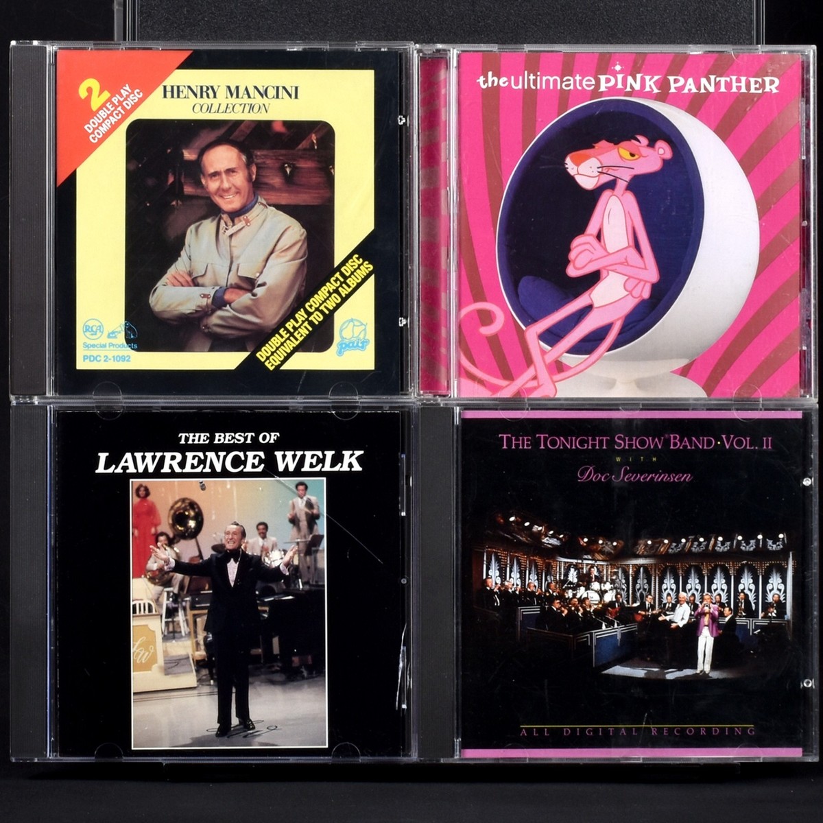 Boîte à musique à manivelle dans une boîte ronde en carton avec mécanisme musical de 18 notes - Référence de cette boîte à musique à manivelle: BPM-PINKPANTHER