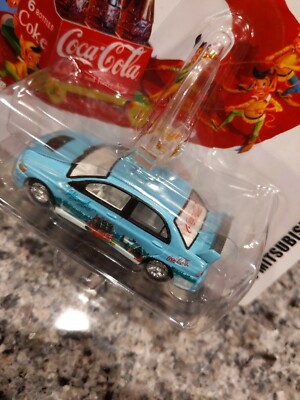 Johnny Lightning Coca-cola 2005 MITSUBISHI LANCER HOLIDAY