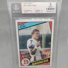 JOHN ELWAY 1984 TOPPS ROOKIE CARD #63 RC Beckett 8 NM-MINT Denver Broncos 