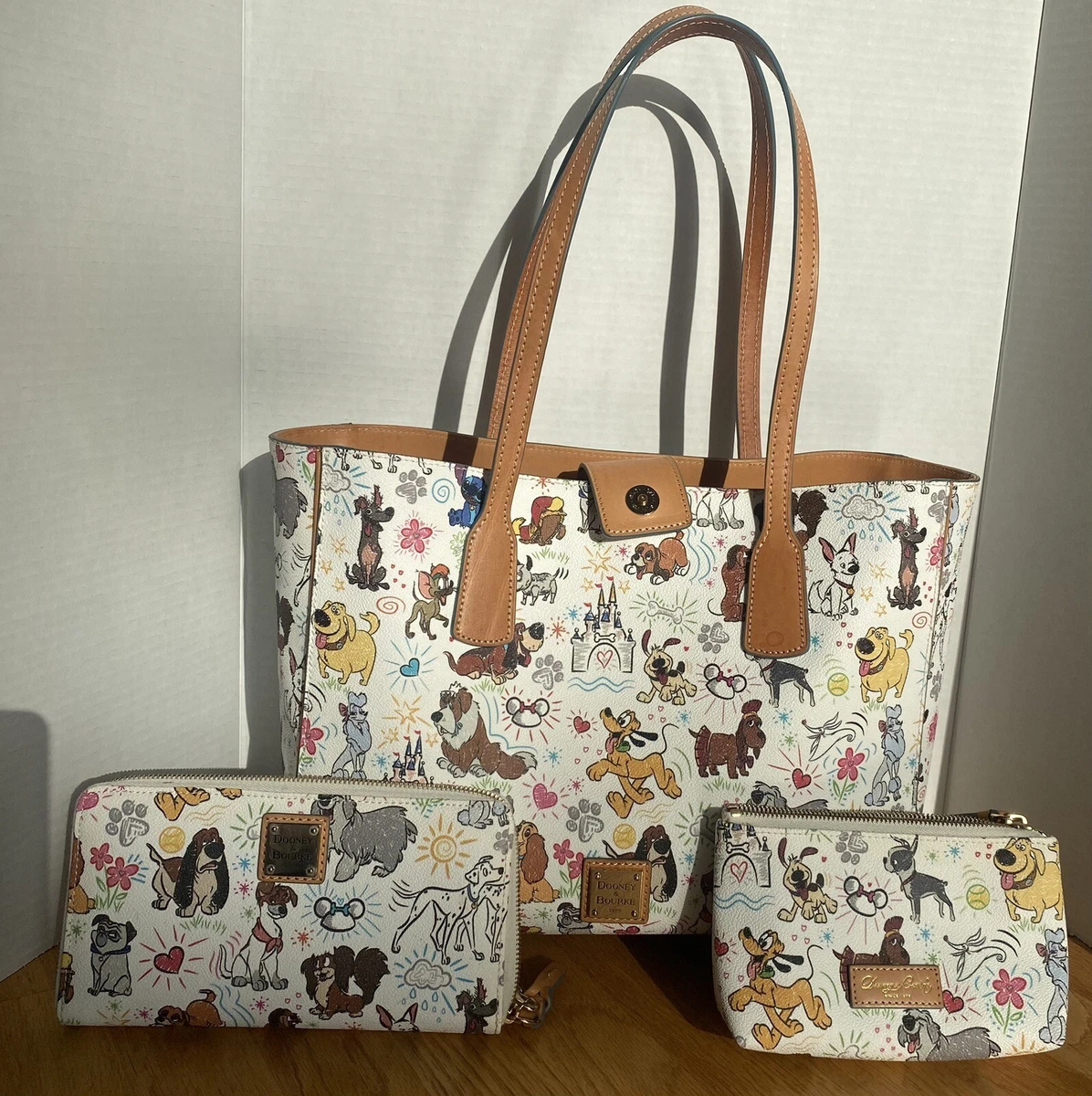 Disney paw prints wallet by dooney & bourke sale